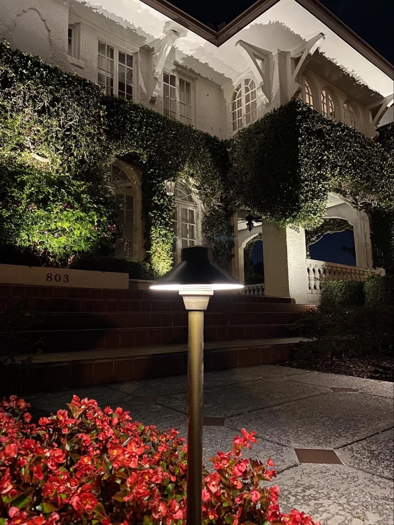 Gorgeous install by Southern Outdoor Lighting in Orlando showing a standard style path fixture