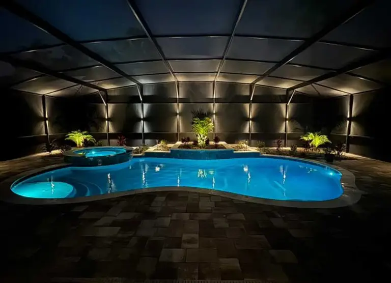 Lighting of a screened in swimming pool installed by Southern Outdoor Lighting